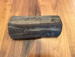 Ebony Wood Half Log, 10 1/2" Length, 3 1/4" Radius, 5" Width At Base. Fixed Price $100.00.